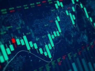 Stock market chart with teal candlesticks and a trend line showing price movement over time on a dark blue background.