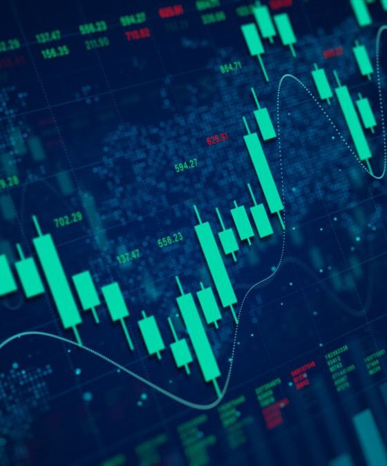 Stock market chart with teal candlesticks and a trend line showing price movement over time on a dark blue background.