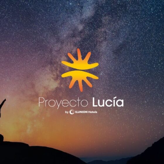 Starry night sky with a silhouette of a person on a rock raising an arm, overlaid with the Proyecto Lucía logo by ILUNION Hotels.