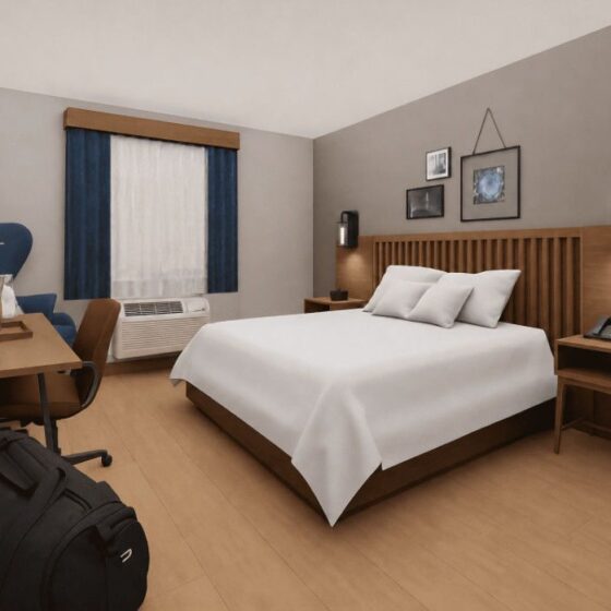 Hotel room with a large bed, white bedding, wooden headboard, and two nightstands with wall lamps on each side.