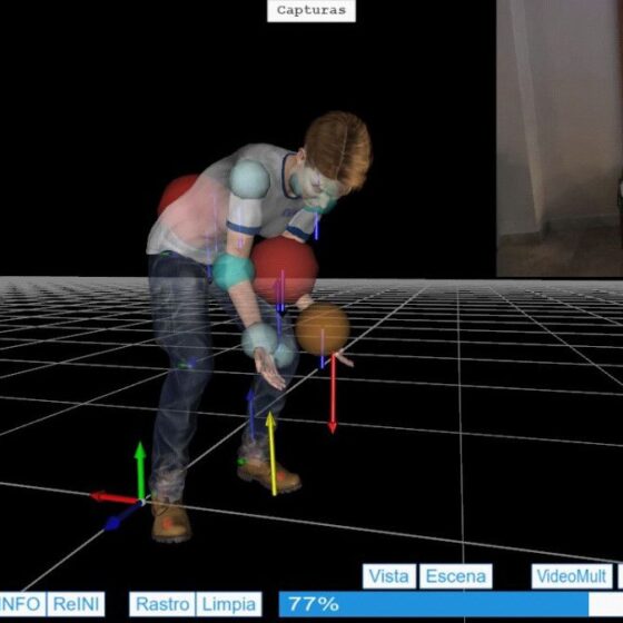 3D motion capture setup: a person bending forward with markers on joints, standing on a grid floor, with a video inset of another person in a room